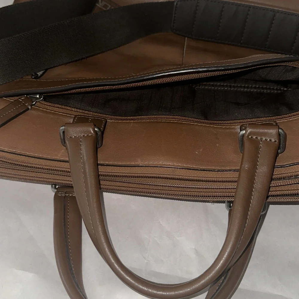 TUMI; Brown Leather Expandable Laptop Bag.